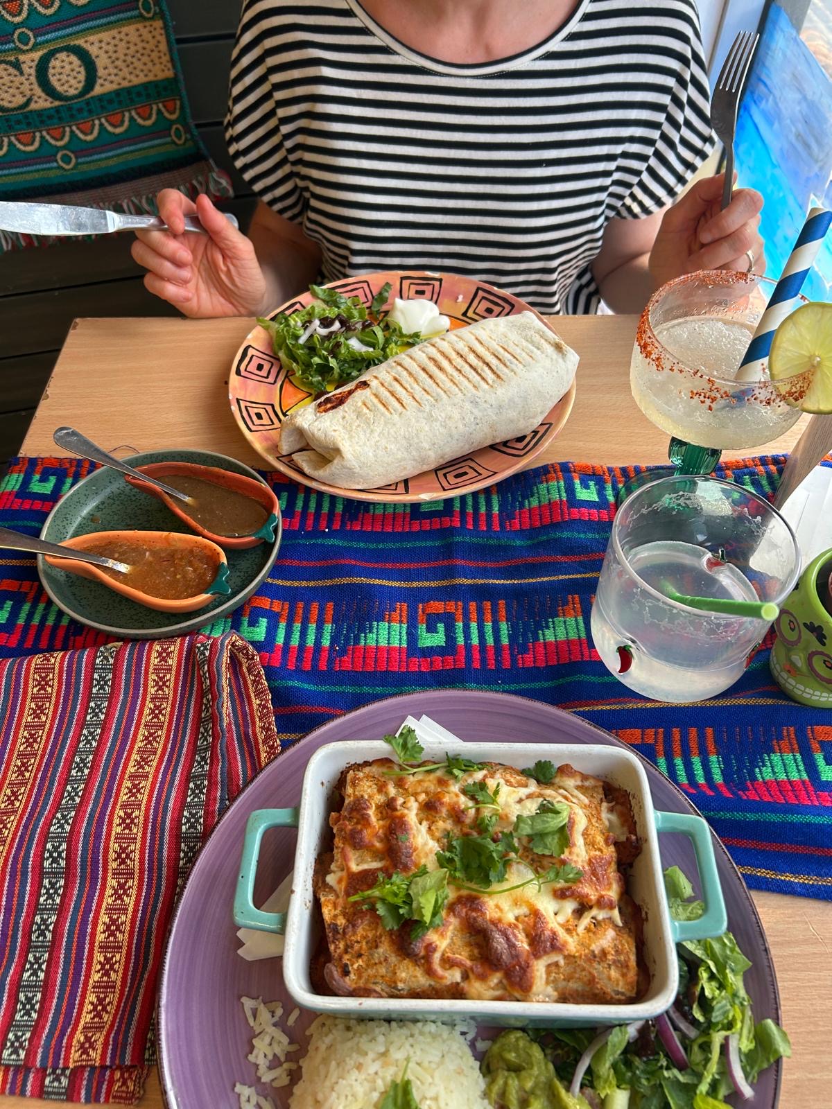 Food and drinks at a colourful Hooleos table
